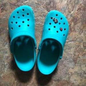 Teal crocs